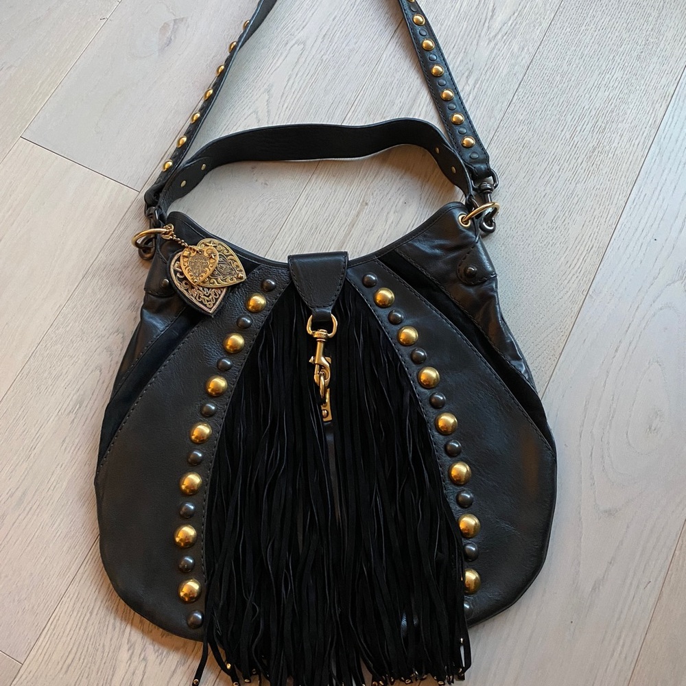 Authentic Gucci fringe Babushka hobo bag. Black and Gold. Perfect condition